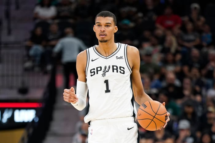 Oct 13, 2023; San Antonio, Texas, USA; San Antonio Spurs center Victor Wembanyama (1) dribbles the ball up court during the first half against the Miami Heat at Frost Bank Center.